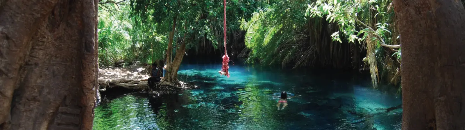 Relaxing swimming in the clear turquoise waters of the Chemka Hot Springs Day Trip.