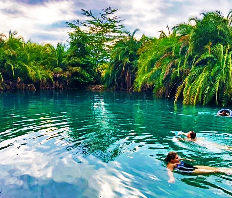 Crystal-clear natural pool at Chemka Hot Springs in Tanzania.