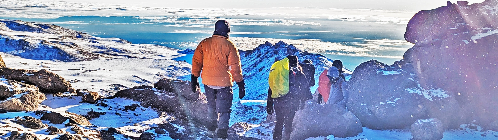 Summit success and descent past Stella Point on the fast 5-day Marangu route fixed departure.