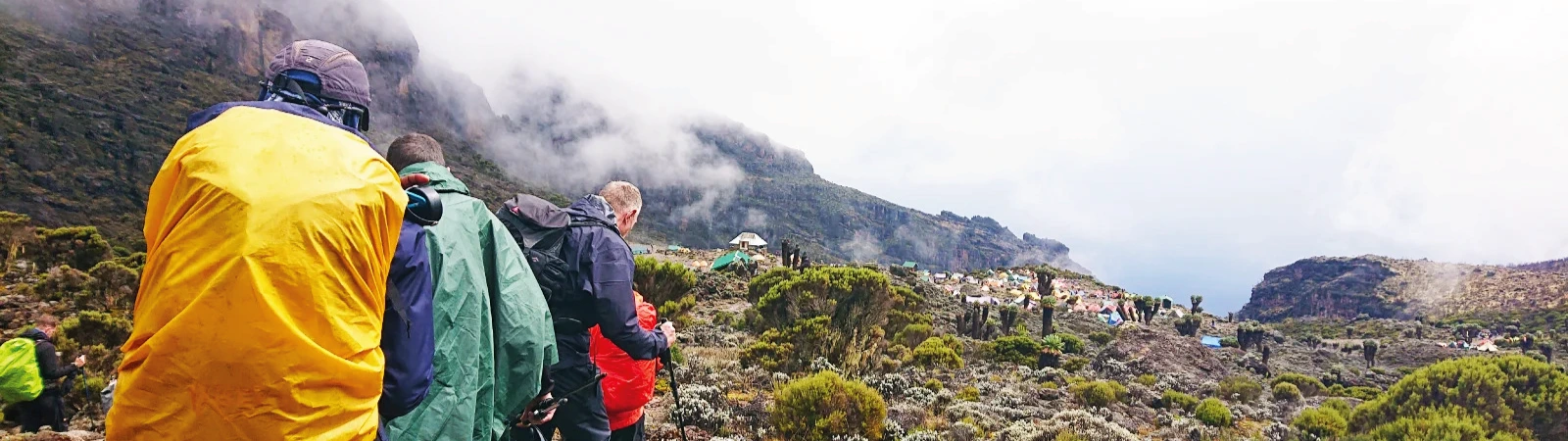 Group descending into the beautiful Barranco Camp on the 6-day Machame route fixed departure trek.
