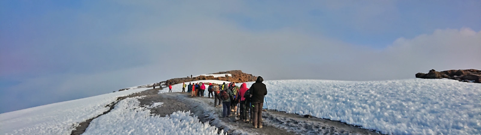 Group on the final summit ascent for the 7-day Rongai route fixed departure trek.