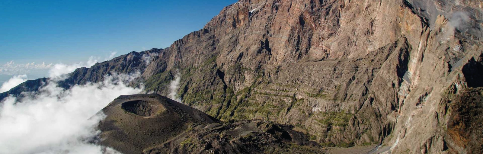 View from the summit of Mount Meru overlooking the volcanic crater pit in Arusha National Park