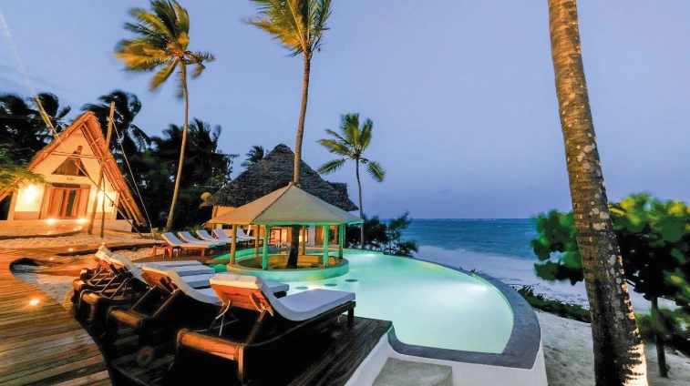 Hotel outdoor seating with a calm sea view in Zanzibar
