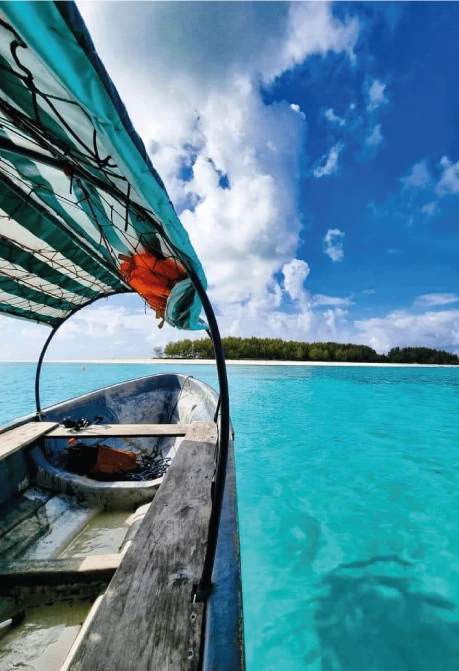 Tour boat trip on clear blue water in Zanzibar